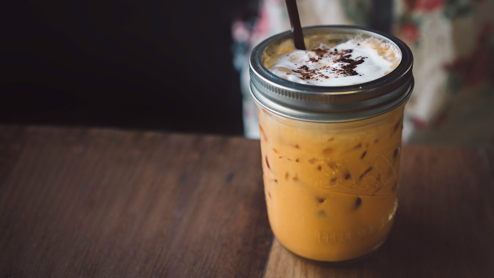 photo of mason jar with straw