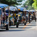 blue-and-yellow autorickshaws